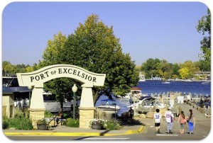 excelsior sign with lake in background