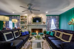 Beautiful living room interior with teal walls.